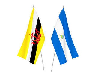 National fabric flags of Nicaragua and Brunei isolated on white background. 3d rendering illustration.