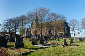 Village church (Dorpskerk) in Hoog-Keppel (Gelderland, The Netherlands) with graveyard.