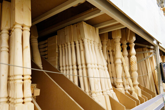 Wooden baluster on a shelf in a hardware store. 