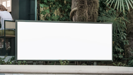 Spacious blank white banner for mockup information fixed outside of hotel or restaurant entrance