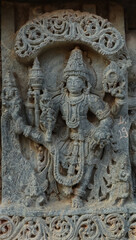Fototapeta na wymiar The Beautiful Sculpture of Lord Vishnu on the Lakshminarsimha Temple, Javagal, Hassan, Karnataka, India.