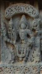 Fotobehang The Beautiful Sculpture of Lord Vishnu on the Lakshminarsimha Temple, Javagal, Hassan, Karnataka, India. © Raj