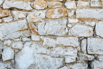 Old gray grunge stone wall background, texture