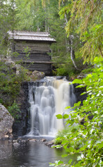 Komulanköngäs Hyrynsalmi Finland. A beautiful waterfall and an old mill.