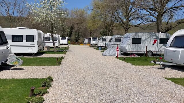Caravans in a row in the campsite, Caravan Camping Site In Nature, Travel Trailers in the Camping ground. Agva, Turkey. 