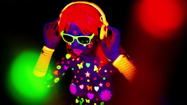 Female dancer in glow UV costume