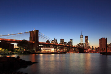 Naklejka na ściany i meble Brooklyn bridge and NYC skyline, New York City, USA