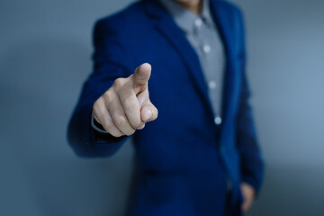 Male businessman hand touching an imaginary screen with her finger