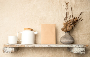 ceramic teapot on a shelf, craft paper notice or message page, copy space for promo or ad, banner