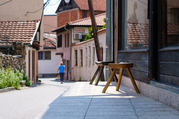 small chairs in front of a barber shop in Prizren Kosovo