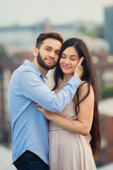 Fototapeta premium Smiling, loving, beautiful people spend time together outdoors. couple in love outdoors.Concept of love, people, happiness and lifestyle.