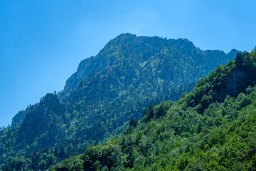 Fototapeta na wymiar Sharri mountains from rugova kosovo. Green mountains with a blue sky.