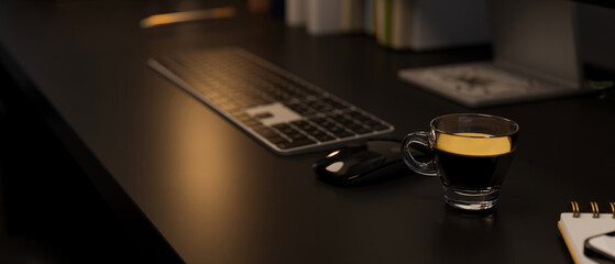 close-up, Modern black office desk workspace with keyboard, mouse and coffee cup