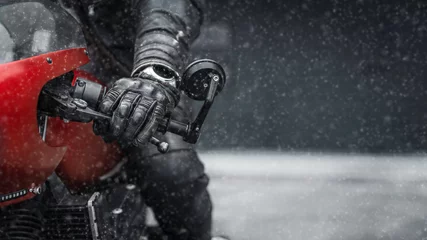 Foto op Plexiglas Hand in glove on motorcycle handlebar in winter, free space for insertion © uladzislaulineu