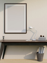 Minimal working space with classic dark wood work table and empty frame mockup on the white wall