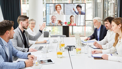 Group of business people in video conference at meeting