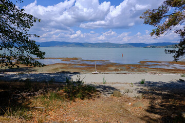 Free beach of lake Trasimeno at Isola Polvese, Italy
