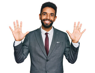 Young african american man wearing business clothes showing and pointing up with fingers number ten while smiling confident and happy.