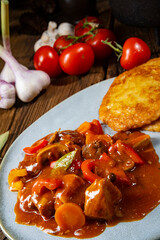 Hungarian goulash with potato pancakes