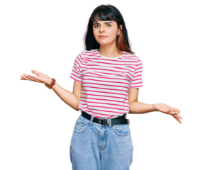 Young hispanic girl wearing casual clothes clueless and confused with open arms, no idea concept.