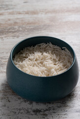 close-up shot of bowl of rice on wooden tabletop