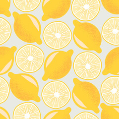 Bright and yellow hand drawn vector seamless pattern with whole and sliced lemons