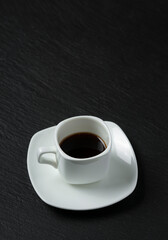close-up shot of cup of coffee on black background