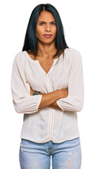 Young african american woman wearing casual clothes skeptic and nervous, disapproving expression on face with crossed arms. negative person.