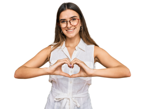 Young hispanic woman wearing casual clothes smiling in love showing heart symbol and shape with hands. romantic concept.