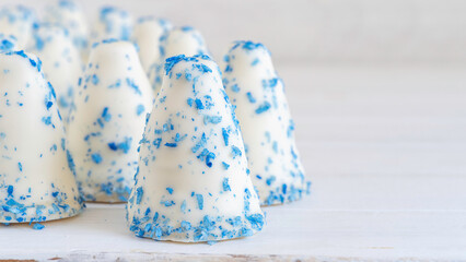 Israeli dessert Krembo in national blue and white colors for Independence Day of Israel. Cool candy...