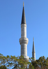 Fototapeta na wymiar Minarets of The Blue Mosque with Blue Sky in Istanbul, Turkey