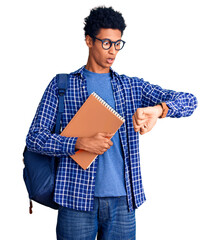 Young african american man wearing student backpack holding book looking at the watch time worried,...