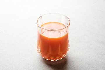 A glass of fresh carrot juice, very good for health. Served in glass. Cold Pressed Juice