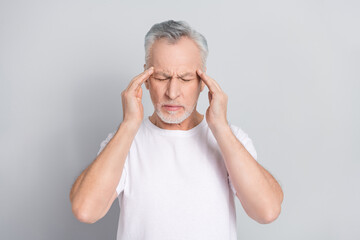 Photo of aged guy had his blood pressure rise up touch head terrible headache isolated silver color background