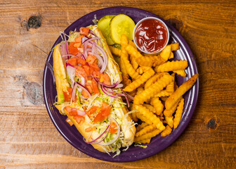 Turkey sub with crinkle cut fries