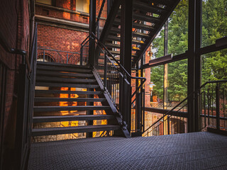 modern staircase in an old brick building. stairs and facade, reconstruction.
