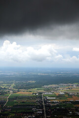Dark, stormy clouds over Poland. View from the plane, polish landscape and dark clouds