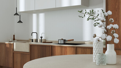 Japandi trendy wooden kitchen and dining room in white and beige tones. Close up on table with cotton flowers, cabinets and marble top. Minimalist interior design © ArchiVIZ