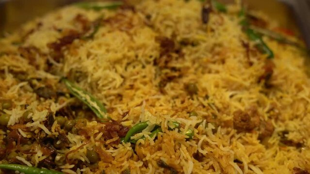 A popular Muslim dish in India is called biryani, which is a concoction of many kinds of rice. It is made with rice, Indian spices and often some type of meat including chicken, lamb, goat, prawns