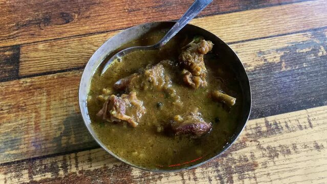 Mutton curry, also known as lamb curry, goat curry, or kosha mangsho, is a meal that is typically served with rice or Indian breads like naan or parotta.
