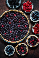 Homemade fresh round cake tart with berries, raspberries, blackberries