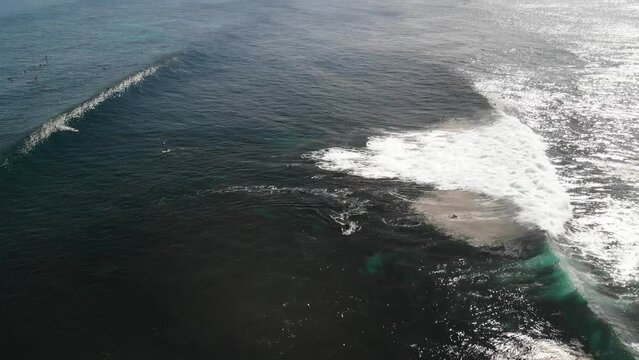 Aerial drone view flying over the turquoise waves, Yallingup beach, Western Australia