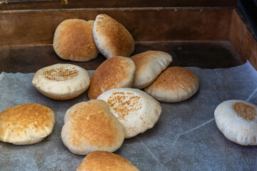 Kinetic sand and molds on blue background. Sensory toys for kids.