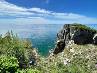 Russia, Vladivostok. The south-eastern coast of the island of Shkota in summer in clear weather