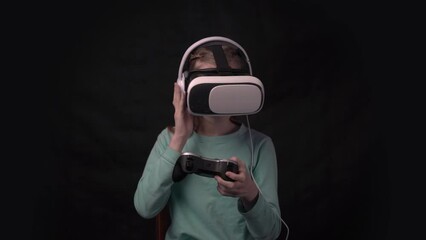 4k child girl at home in virtual reality VR glasses playing game