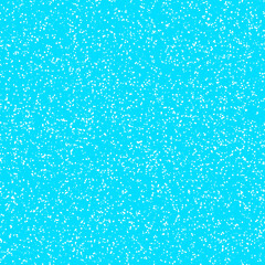 White speckled paper on a vivid cyan surface