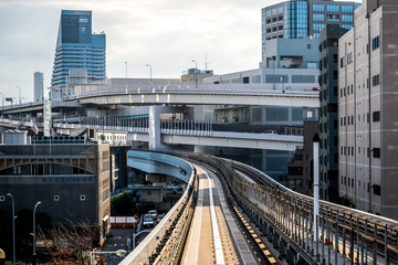 Fototapeta na wymiar Transport overpasses roads and railway tracks in Tokyo city, Japan