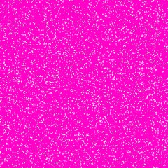 White speckled paper on a magenta surface