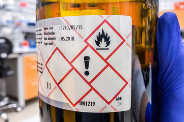 A bottle of a highly flammable chemical agent. 