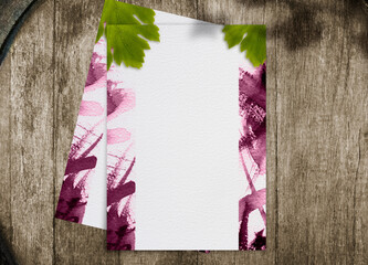 Wine list mockup with red wine stains and vine leaves. Wine barrel texture background
